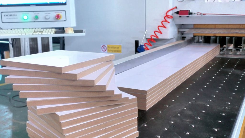 Cut melamine-faced panels on EP Series beam saw at Metro Wardrobes UK furniture manufacturer
