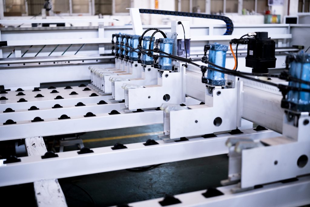 Pneumatic gripper pusher beam system on EP Series CNC beam saw for furniture and joinery UK