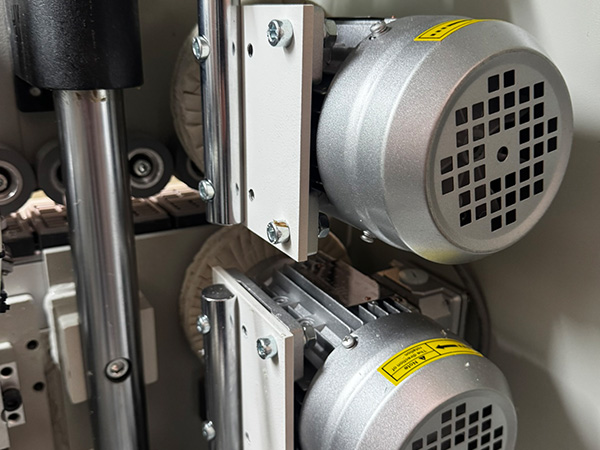 PowlTech PE3 twin-head buffing unit polishing a finished edge for UK furniture manufacturers